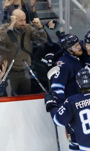 Wheeler scores early in OT and Jets beat Predators 5-4